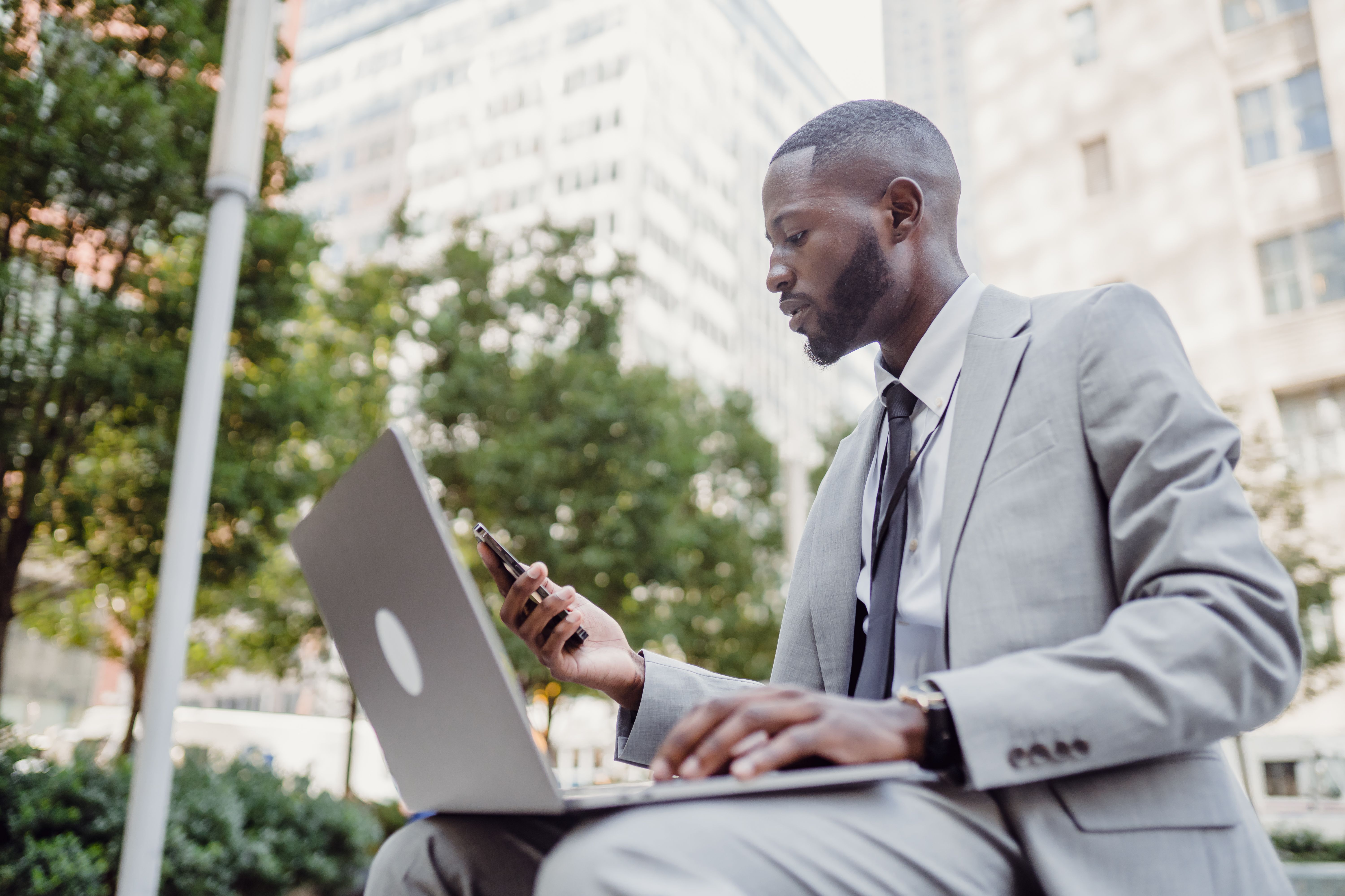 Business owner reviewing results on a laptop
